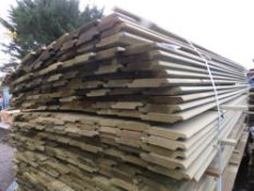 LARGE PACK OF TREATED SHIPLAP TIMBER CLADDING BOARDS. 1.73M LENGTH X 95MM WIDTH APPROX.