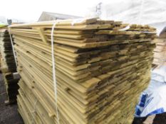 LARGE PACK OF TREATED SHIPLAP TIMBER CLADDING BOARDS. 1.73M LENGTH X 95MM WIDTH APPROX.