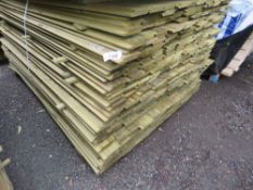 LARGE PACK OF TREATED SHIPLAP TIMBER CLADDING BOARDS. 1.73M LENGTH X 95MM WIDTH APPROX.