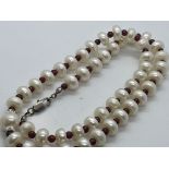 Pearl and garnet beads