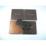 Assorted Gucci Manuals