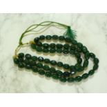 Triple strand onyx bead necklace