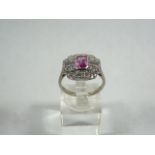 Platinum pink sapphire and diamond ring