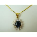 9ct gold sapphire and diamond pendant