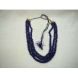 957ct blue onyx triple string necklace