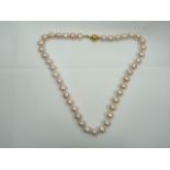 Pink hue pearl string