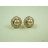 Pair of pearl and diamond earrings