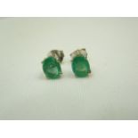 Oval emerald silver stud earrings