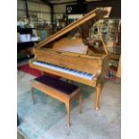 A Baby Grand piano by Moore and Moore originally supplied by Beestons Tiverton also with a duet