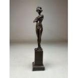 A Bronze figure of a lady signed Y.Orie on square plinth. H:24cm