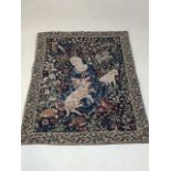 An old french tapestry depicting a seated lady and animals W:44cm x H:58cm