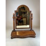 A dome topped serpentine fronted dressing table swing mirror with painted details and large lift