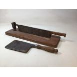 A vintage bread cutter on board together with a vintage Elwell military cleaver dated 1943 W:62cm