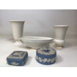 Three Wedgwood flower vases and trough together with two Jasper ware trinket boxes. H:24cm Tallest
