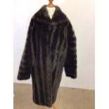 Vintage simulated fur coat by Tissavel, France, tetailedby Maxwell Cowan. Approx size 10
