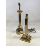 A pair of brass style lamp bases. Tallest is 52cm