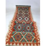 A Chobi Kilim runner W:58cm x H:194cm