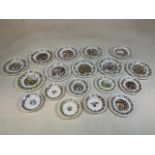 Eighteen Royal Doulton brambly Hedge collectors plates. also with two arts and crafts glass vases.