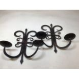 A pair of wrought iron candle sconces W:40cm x H:46cm