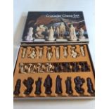 A vintage Crusader chess set - complete. 4 inch king - felted bases. Copyright dated 1974 W:41cm x