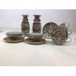 A quantity of oriental China. Including a pair of vases and cups and saucers