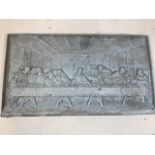 A Cast iron fireback depicting last supper. Zinc treated to stop corrosion. W:65cm x H:36cm