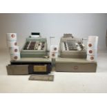 Two Burroughs 20th century shop tills with original till rolls.