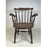 A Swedish early 20th century stick back penny seat with scroll arms. Possibly made by Ibex. Seat