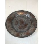 An old copper dish reported to be found in Iraq circa 1748 engraved with name of owner Leila