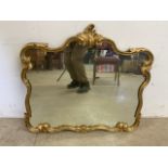 A Modern French style mirror with ornate gilt frame. W:75cm x H:70cm