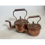 Two copper kettles. Largest H:33cm