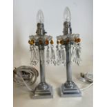 A Pair of modern silvered table lamps with amber and clear glass drop lustres. H:33cm