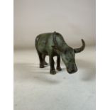 A heavy bronzed figure of an Oxen. W:15cm x H:9cm