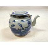 AN 18TH -19TH century Chinese cobalt blue porcelain teapot with wire handle. H:12cm