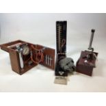 Medical interest. Three vintage medical items. A Cased medical microscope by Gowlands Ltd, an Accson