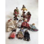 A quantity of tourist/souvenir dolls A/F