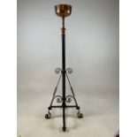 A wrought iron, copper and brass adjustable stand. H:125cm