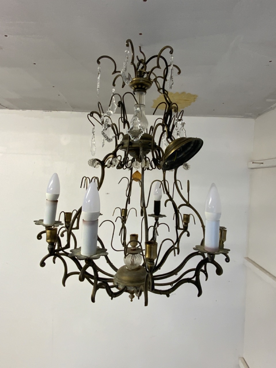 A large gilt metal chandelier with drop lustres. H:75cm