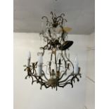 A large gilt metal chandelier with drop lustres. H:75cm