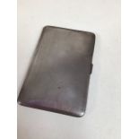 A silver cigarette case engined turned outer. Weight 198gm