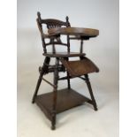 A Victorian oak metamorphic childs high chair.