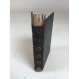 A hand written and illustrated book entitled Bridge, bound in leather, 1946 W:12cm x H:17cm