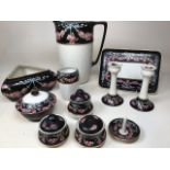 A Grimwades black and pink floral design part wash stand set - 11 pieces in total