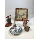 A collection of oriental items to include a hand painted on silk bird and blossom tree, a Chinese