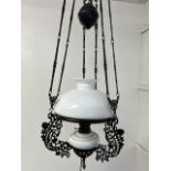 A Vintage Dutch-Indonesian rise and fall opaque glass hanging light. 150cm max 115cm min.