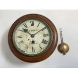 An oak cased wall clock, Sermon Torquay 8inch dial. With pendulum. Fusee movement.