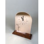 An Art Deco wood and peach mirrored clock etched with nude W:27cm x D:9cm x H:33cm