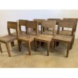 A set of eight solid oak dining chairs. Each chair shaped for comfort. Seat heigh H:45