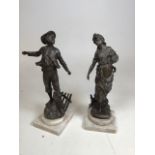 A pair of bronze style figures of a shepherdess and boy on marble plinths H:36cm