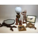 A Vintage Veritas oil lamp H:54cm also with a miniature spinning wheel, two terracotta figures and
